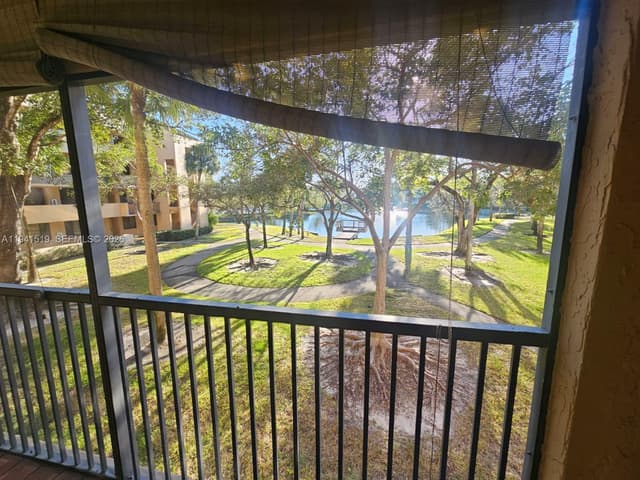 8592 W Sunrise Blvd # 209, Plantation FL 33322 - Plantation, FL - Photo 2