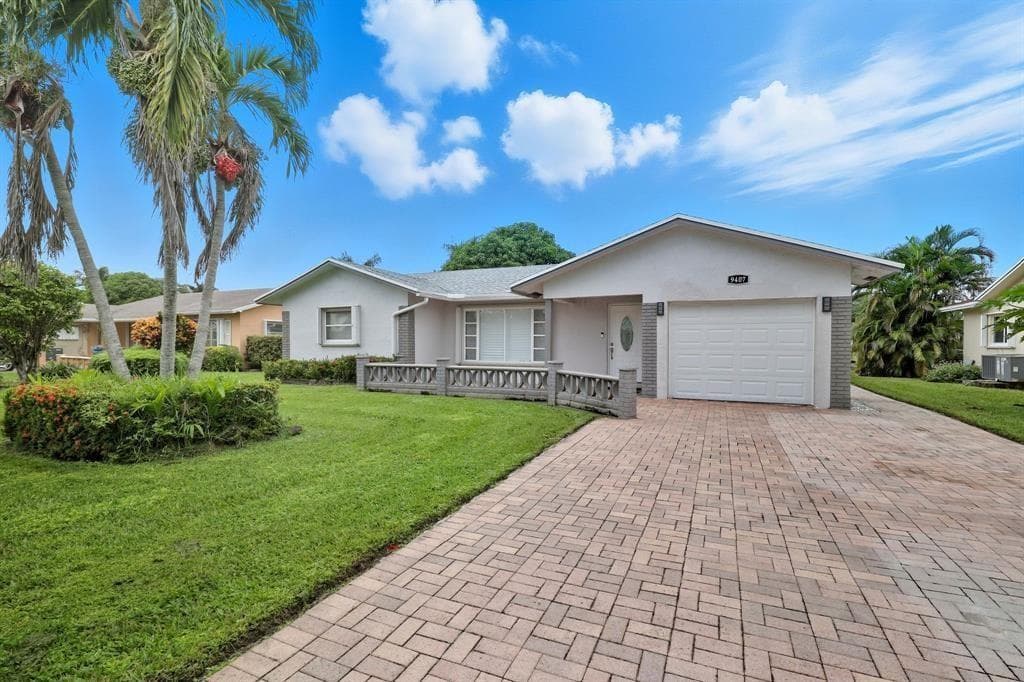 9407 NW 70th Place, Tamarac FL 33321 - Tamarac, FL - Photo 1