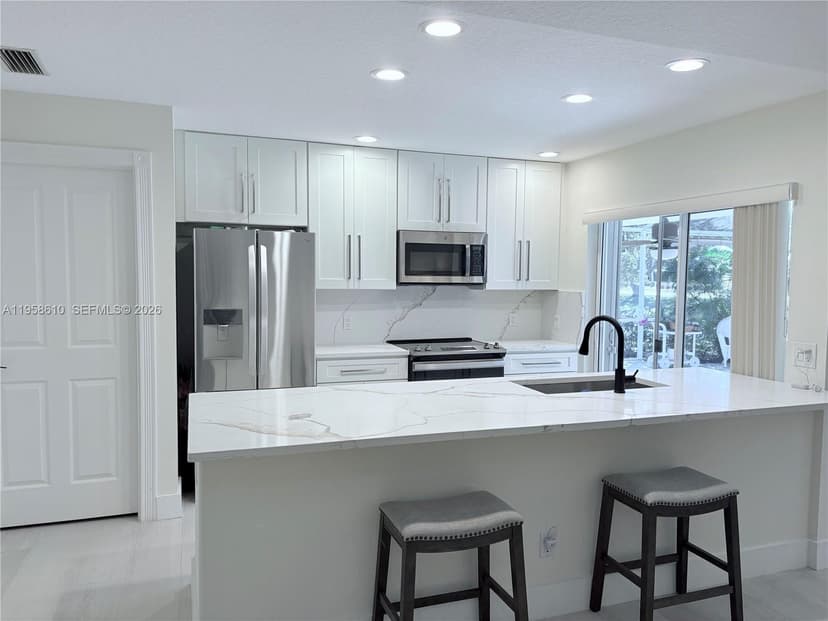 803 Silverleaf Oak Ct, Palm Beach Gardens FL 33410