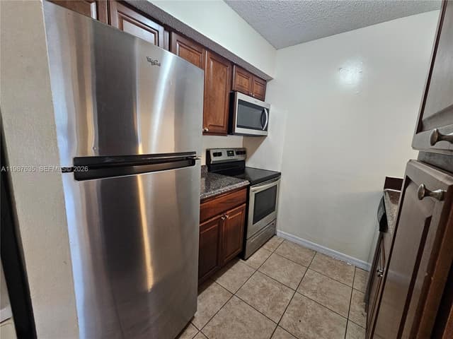 5686 Rock Island Rd # 126, Tamarac FL 33319 - Tamarac, FL - Photo 6