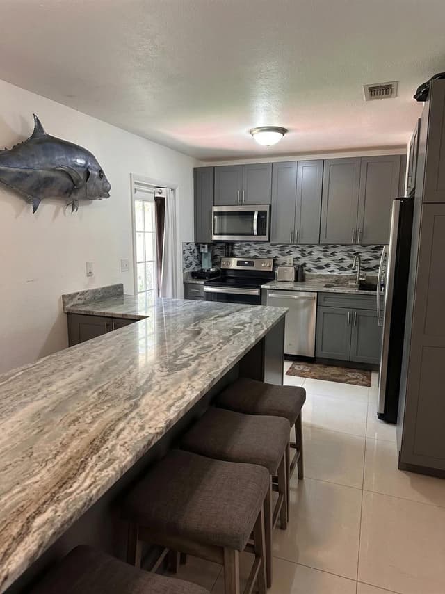 1230 NE 26th Terrace, Pompano Beach FL 33062 - Pompano Beach, FL - Photo 5