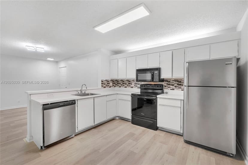 5661 Riverside Dr, Coral Springs FL 33067