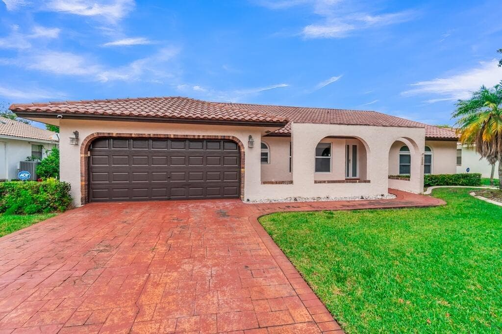 895 NW 110th Lane, Coral Springs FL 33071 - Coral Springs, FL - Photo 1