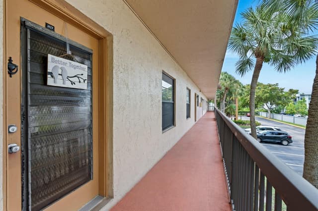 6095 N Sabal Palm Boulevard # 207, Tamarac FL 33319 - Tamarac, FL - Photo 2