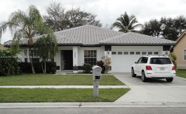 2444 Stonegate Dr, Wellington FL 33414 - Wellington, FL - Photo 1
