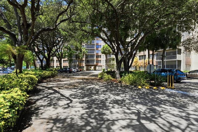 10777 W Sample Road # 407, Coral Springs FL 33065 - Coral Springs, FL - Photo 6