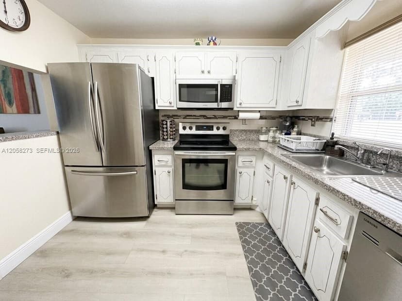 9801 Sunrise Lakes Blvd # 203, Sunrise FL 33322