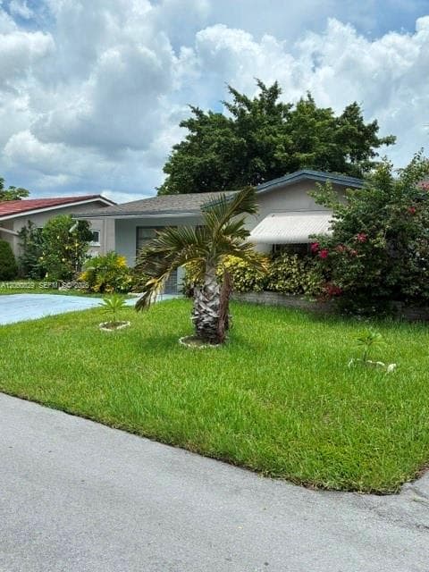 7311 NW 57th Dr, Tamarac FL 33321