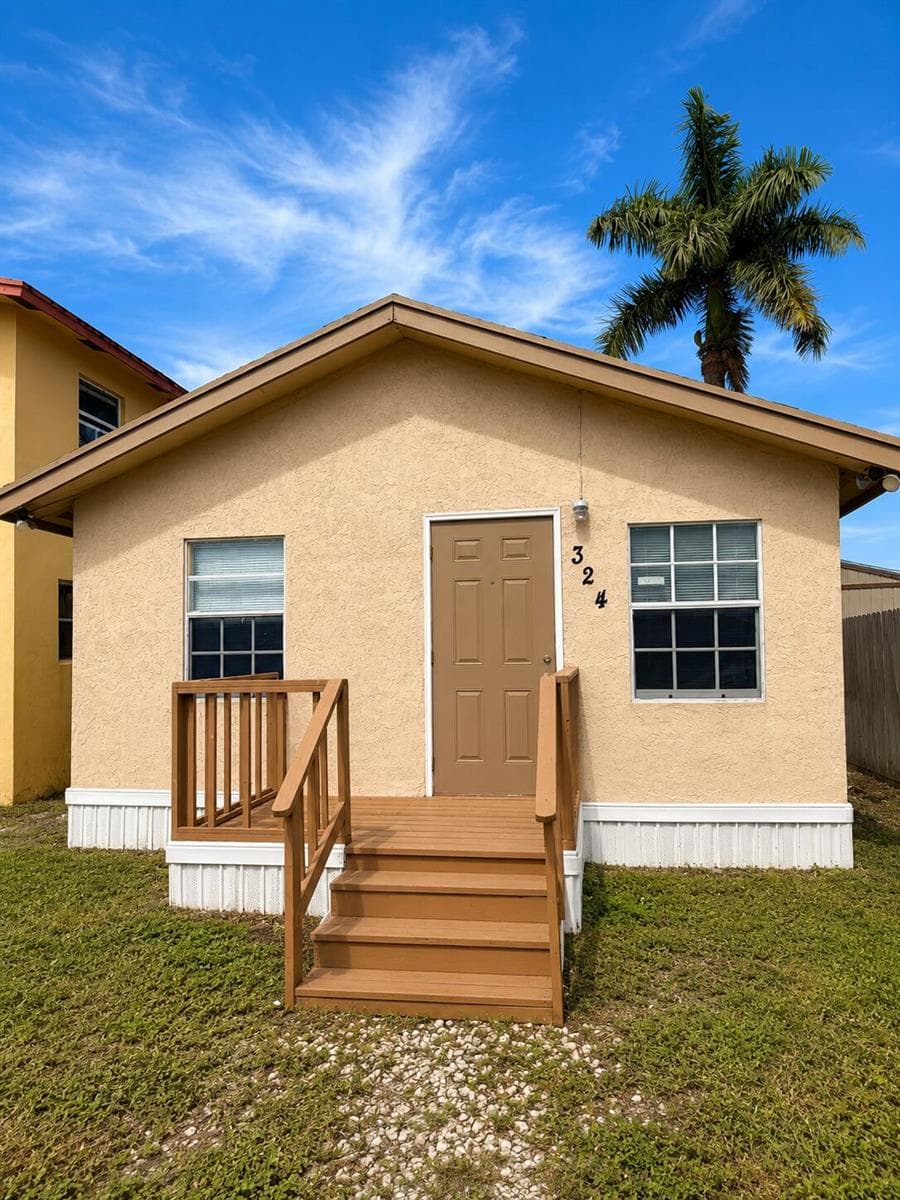 324 SW 8TH Street, Belle Glade FL 33430 - Belle Glade, FL - Photo 1