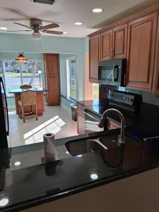 4703 Rainbow Drive, FL 33463 - Photo 2