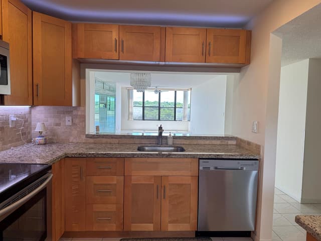 2766 S CARAMBOLA Circle S # 406, Coconut Creek FL 33066 - Coconut Creek, FL - Photo 6