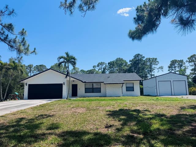 14196 N 77TH Place N, FL 33470 - Photo 2