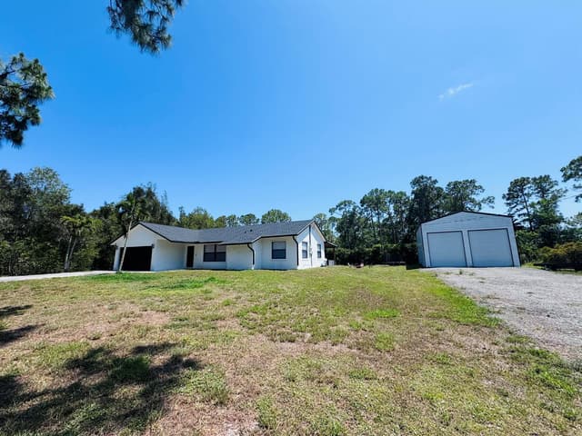 14196 N 77TH Place N, FL 33470 - Photo 3