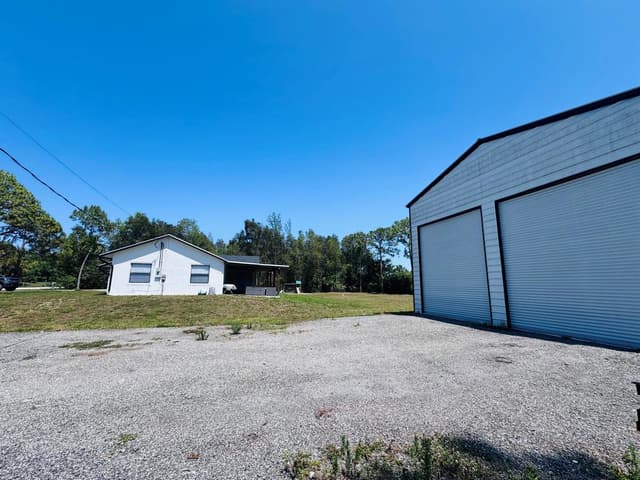 14196 N 77TH Place N, FL 33470 - Photo 5