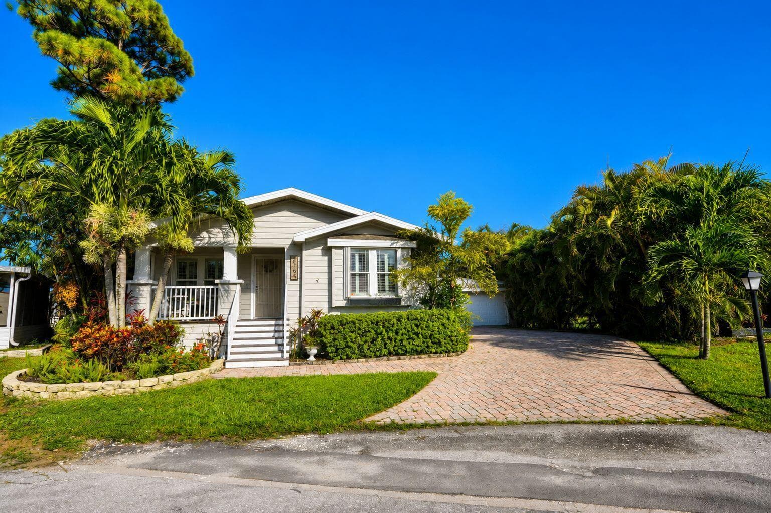 6164 N Ironwood Lane, Atlantis FL 33462 - Atlantis, FL - Photo 1