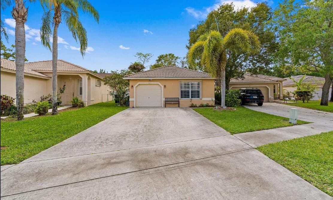 121 Prestige Drive, Royal Palm Beach FL 33411 - Royal Palm Beach, FL - Photo 1