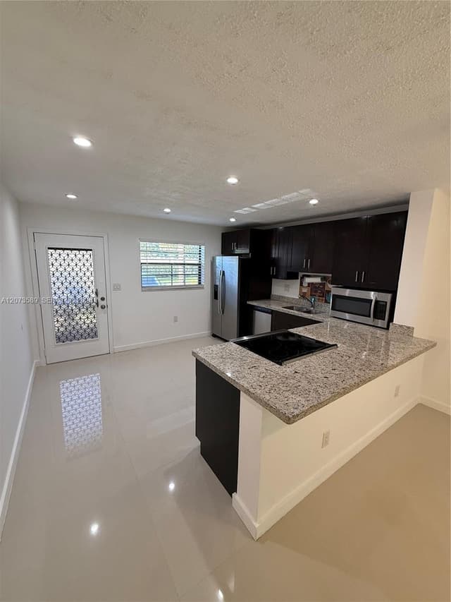 6095 N Sabal Palm Blvd # 103, Tamarac FL 33319 - Tamarac, FL - Photo 6