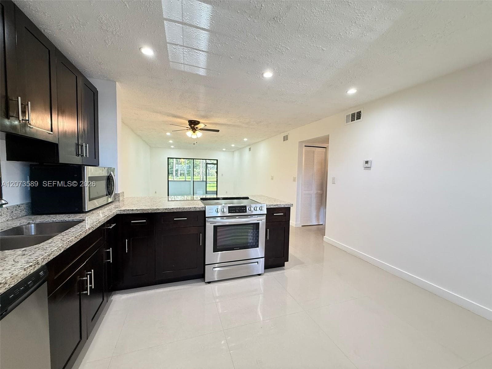 6095 N Sabal Palm Blvd # 103, Tamarac FL 33319 - Tamarac, FL - Photo 1