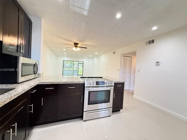 6095 N Sabal Palm Blvd # 103, Tamarac FL 33319 - Tamarac, FL - Photo 5
