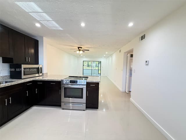 6095 N Sabal Palm Blvd # 103, Tamarac FL 33319 - Tamarac, FL - Photo 4