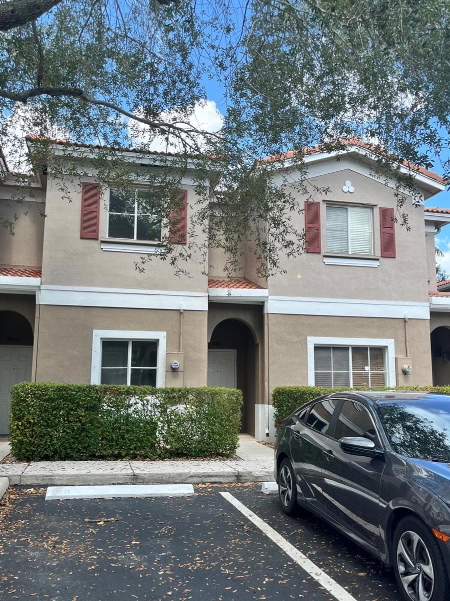 4414 WOODLAND Circle, Tamarac FL 33319 - Tamarac, FL - Photo 1