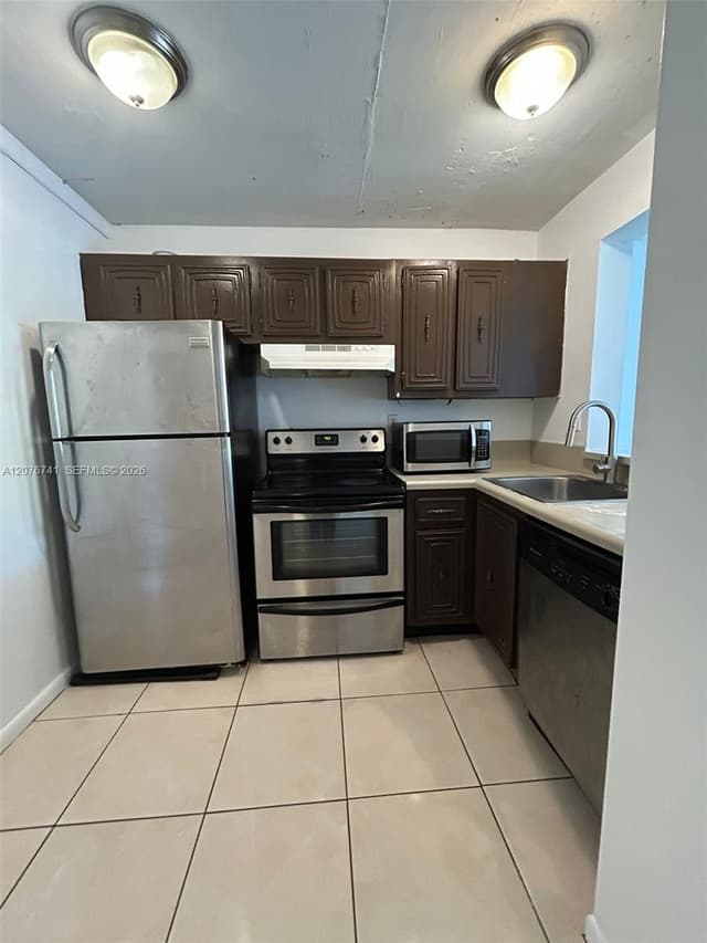 496 NW 165th St Rd # 310, Miami FL 33169 - Miami, FL - Photo 3