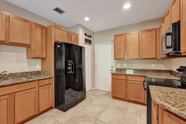 4603 Cohune Palm Court, FL 33463 - Photo 3