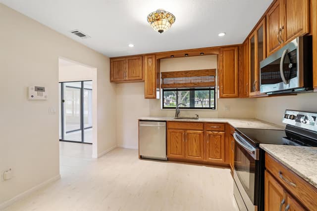 6315 TALL CYPRESS Circle, FL 33463 - Photo 6