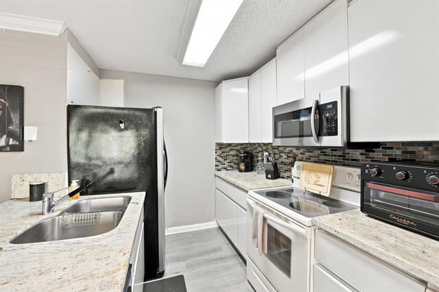 711 FOREST CLUB Drive # 119, Wellington FL 33414 - Wellington, FL - Photo 3