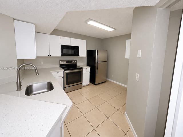 8821 Wiles Rd # 102, Coral Springs FL 33067 - Coral Springs, FL - Photo 2