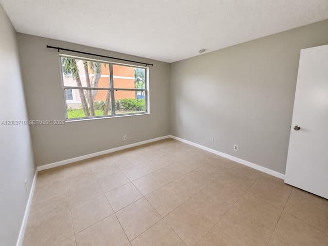 8821 Wiles Rd # 102, Coral Springs FL 33067 - Coral Springs, FL - Photo 7