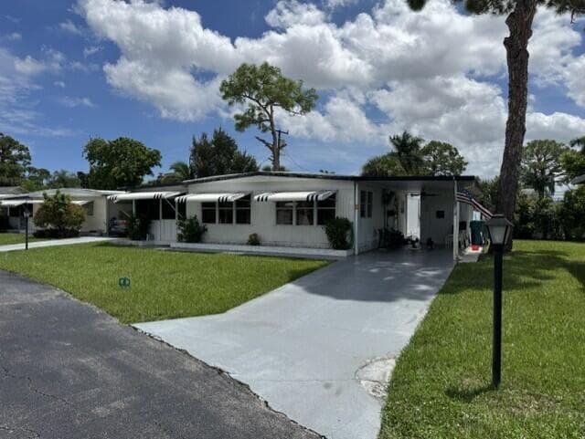 4042 Royal Manor Boulevard, Boynton Beach FL 33436 - Boynton Beach, FL - Photo 1