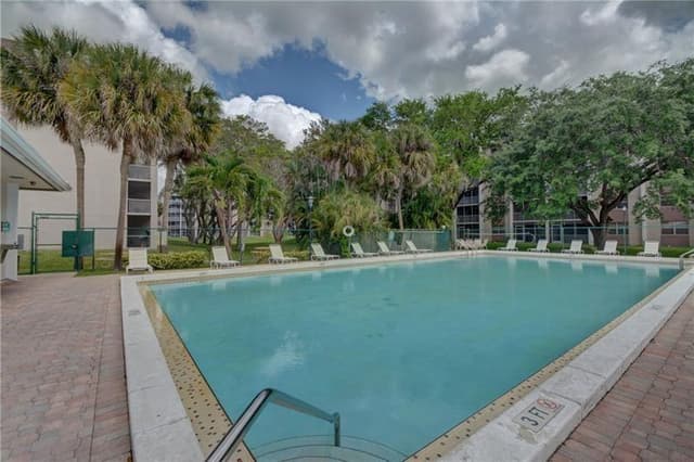 8735 RAMBLEWOOD Drive # 212, Coral Springs FL 33071 - Coral Springs, FL - Photo 2