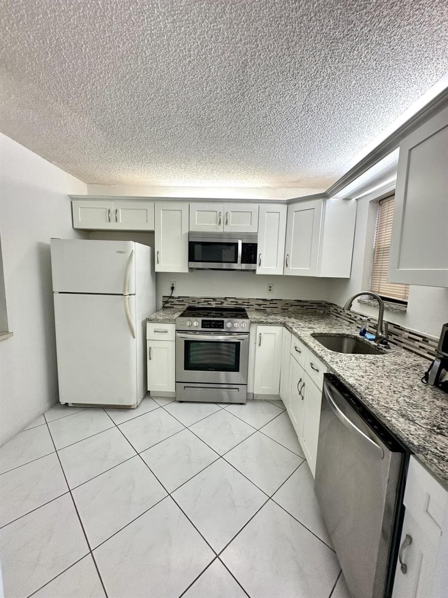 9370 SW 8th Street, Boca Raton FL 33428