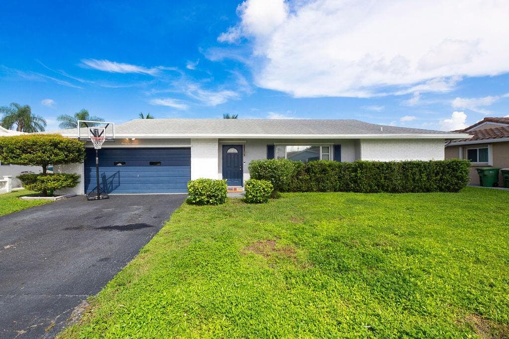 9411 NW 74TH Place, Tamarac FL 33321 - Tamarac, FL - Photo 1