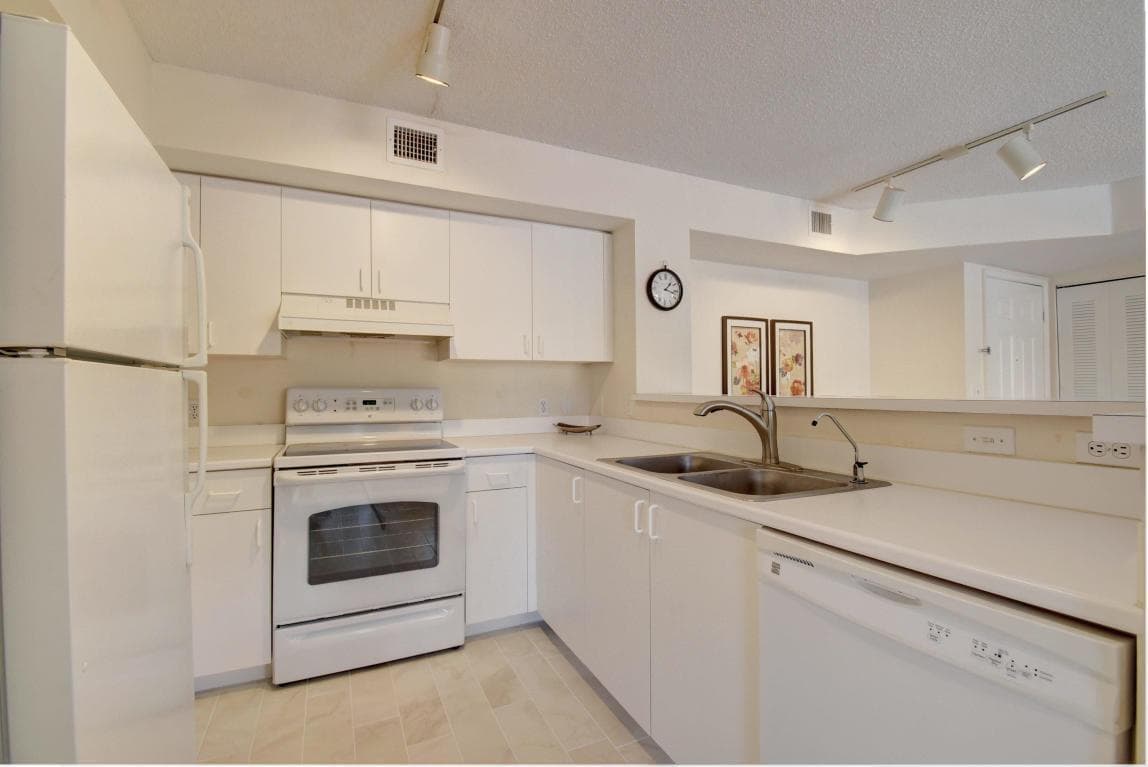 135 Yacht Club Way # 207, Hypoluxo FL 33462 - Hypoluxo, FL - Photo 1