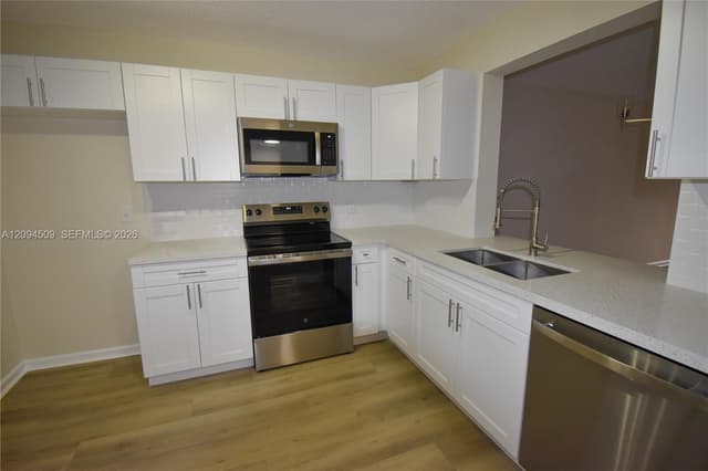 8592 W Sunrise Blvd # 303, Plantation FL 33322 - Plantation, FL - Photo 2