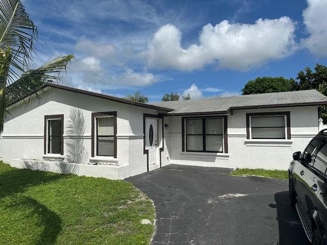 7807 W Kimberly Boulevard, North Lauderdale FL 33068 - North Lauderdale, FL - Photo 1