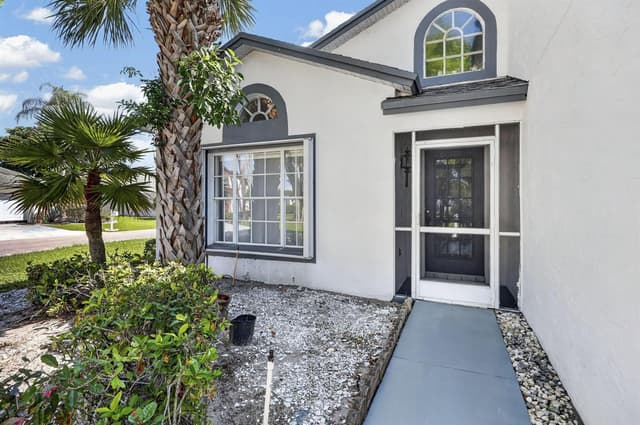 117 HAMMOCKS Court, FL 33413 - Photo 2