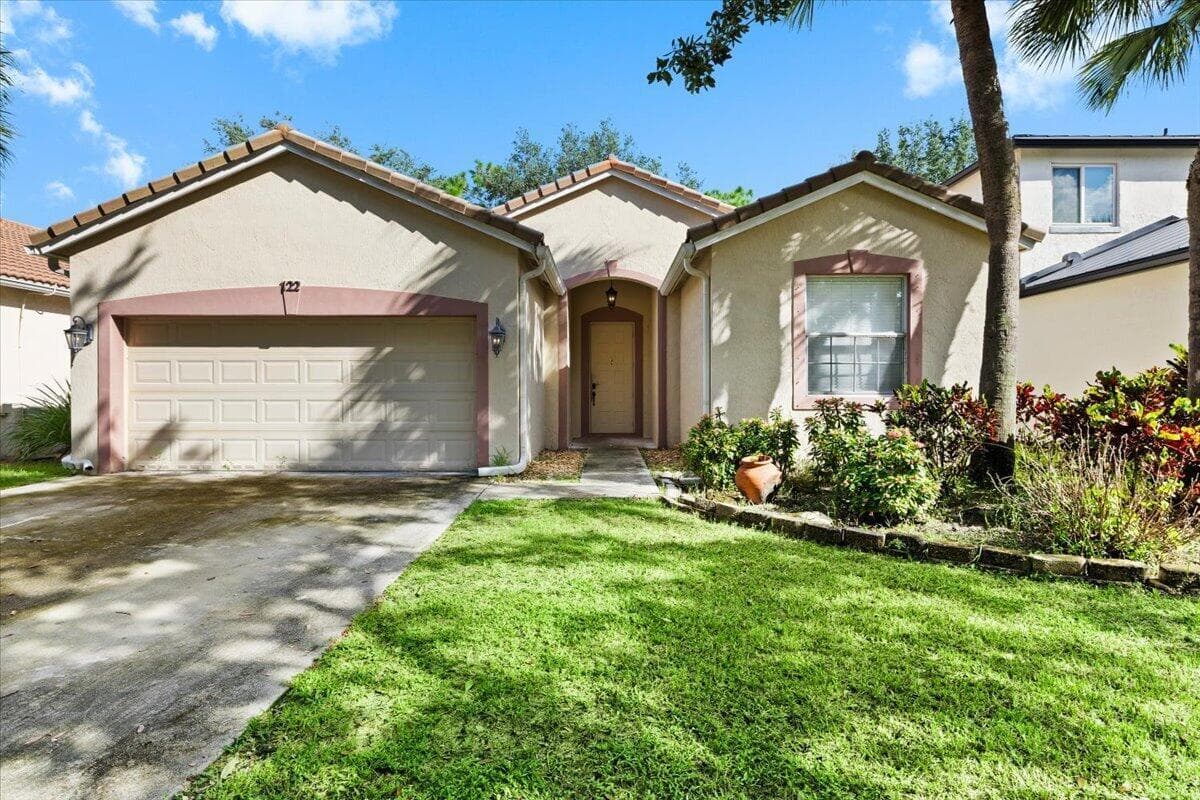122 Seminole Lakes Drive, Royal Palm Beach FL 33411