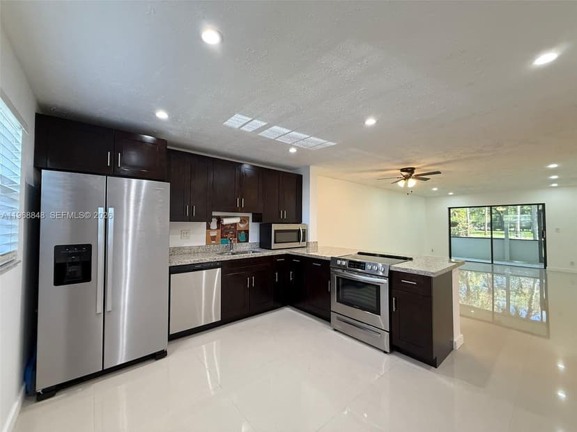 6095 N Sabal Palm Blvd # 103, Tamarac FL 33319