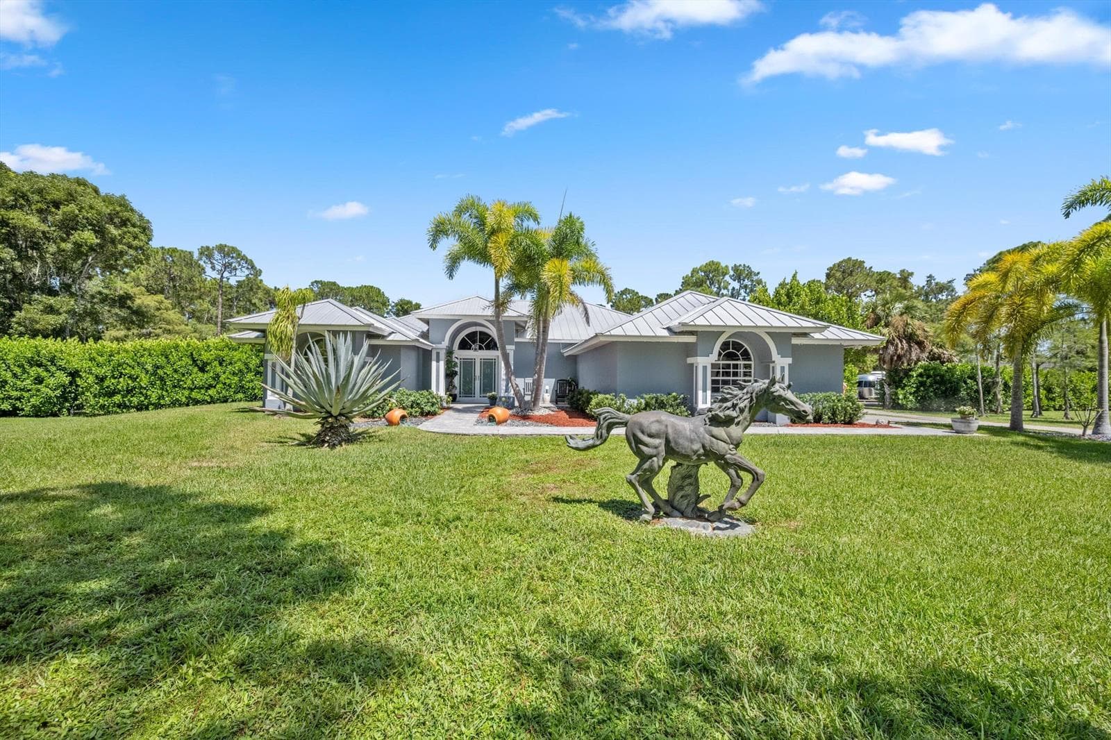 2558 Palm Deer Drive, Loxahatchee FL 33470 - Loxahatchee, FL - Photo 1