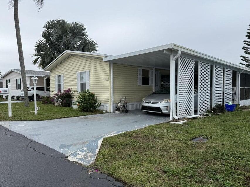 6085 Seashore Drive, Atlantis FL 33462 - Atlantis, FL - Photo 1