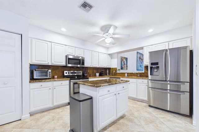 412 Coral Cove Drive, North Palm Beach FL 33408 - North Palm Beach, FL - Photo 3