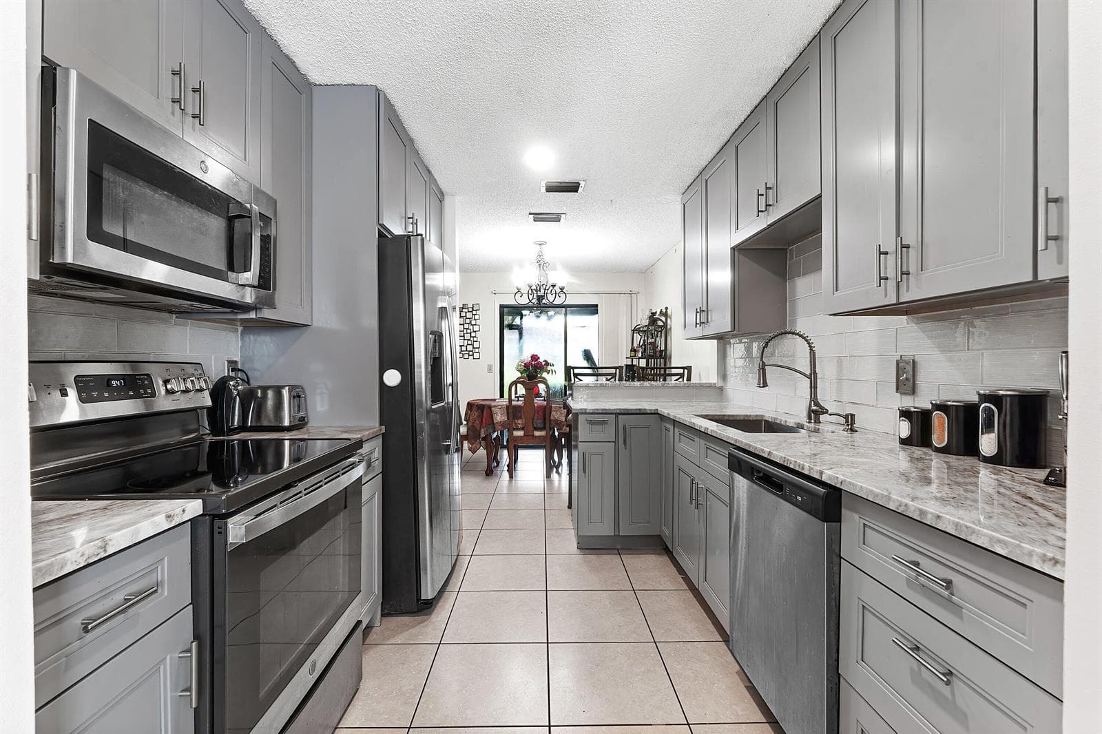 1595 Woodbridge Lakes Circle, West Palm Beach FL 33406 - West Palm Beach, FL - Photo 1
