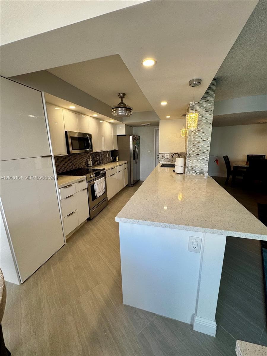 100 Golden Isles Dr # 205, Hallandale Beach FL 33009