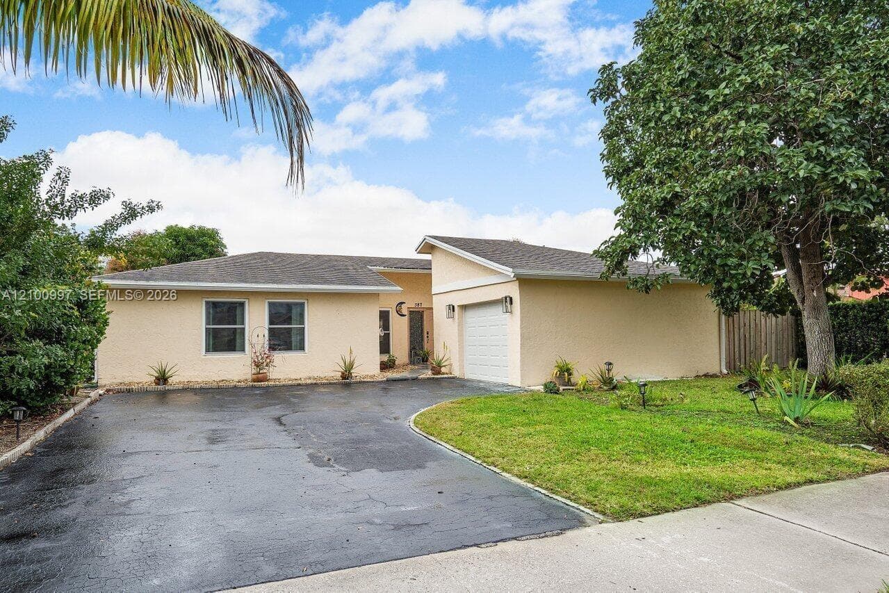 387 NW 39th Way, Deerfield Beach FL 33442 - Deerfield Beach, FL - Photo 1